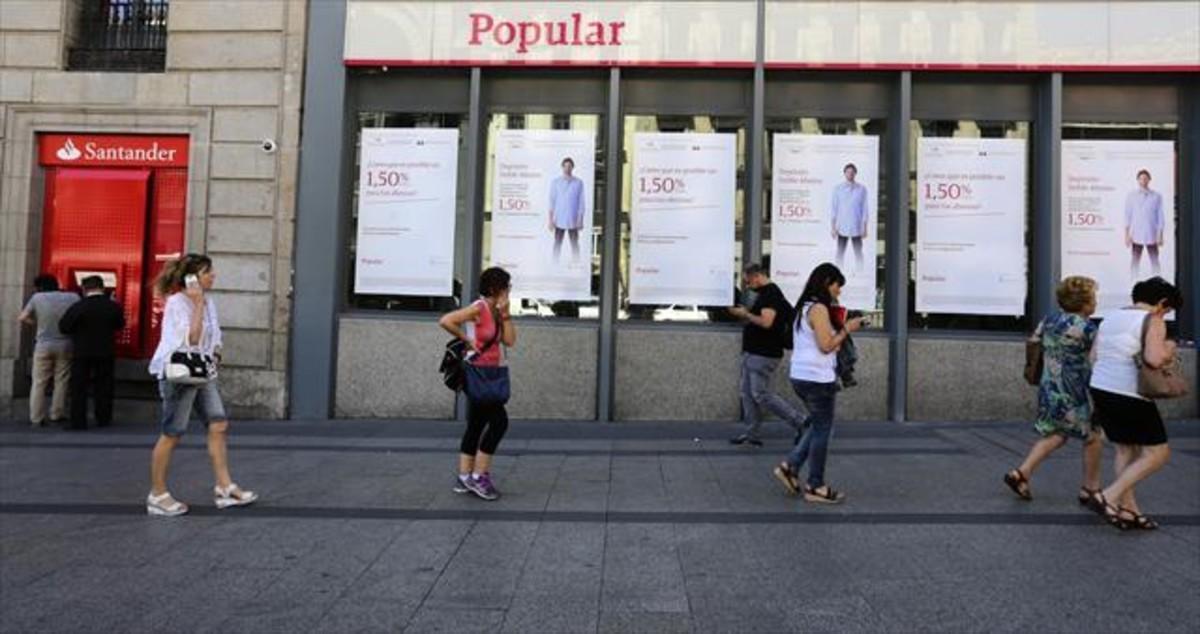 Oficinas del Santander y Popular, en Madrid.