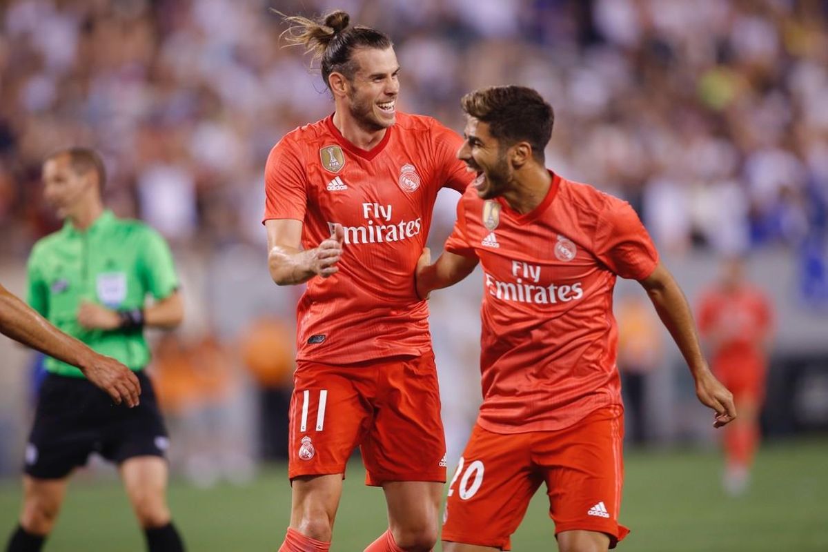 Bale (i) y Asensio celebran uno de los goles ante la Roma. Bale (i) y Asensio celebran uno de los goles ante la Roma.