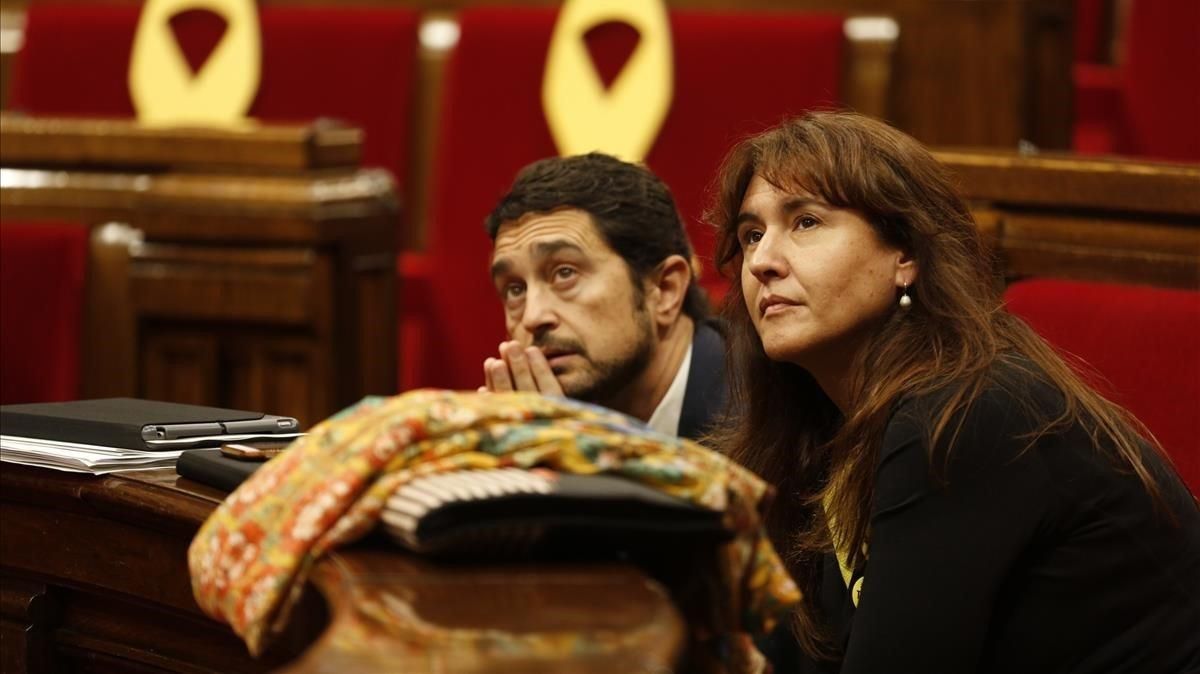Los ’consellers’ Laura Borras y Damià Calvet en un pleno del Parlament. Los ’consellers’ Laura Borras y Damià Calvet en un pleno del Parlament.