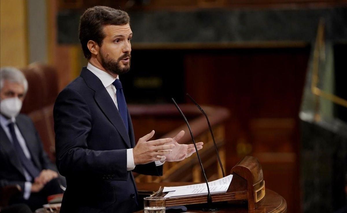 El presidente del PP, Pablo Casado, este jueves en la tribuna. El presidente del PP, Pablo Casado, este jueves en la tribuna.
