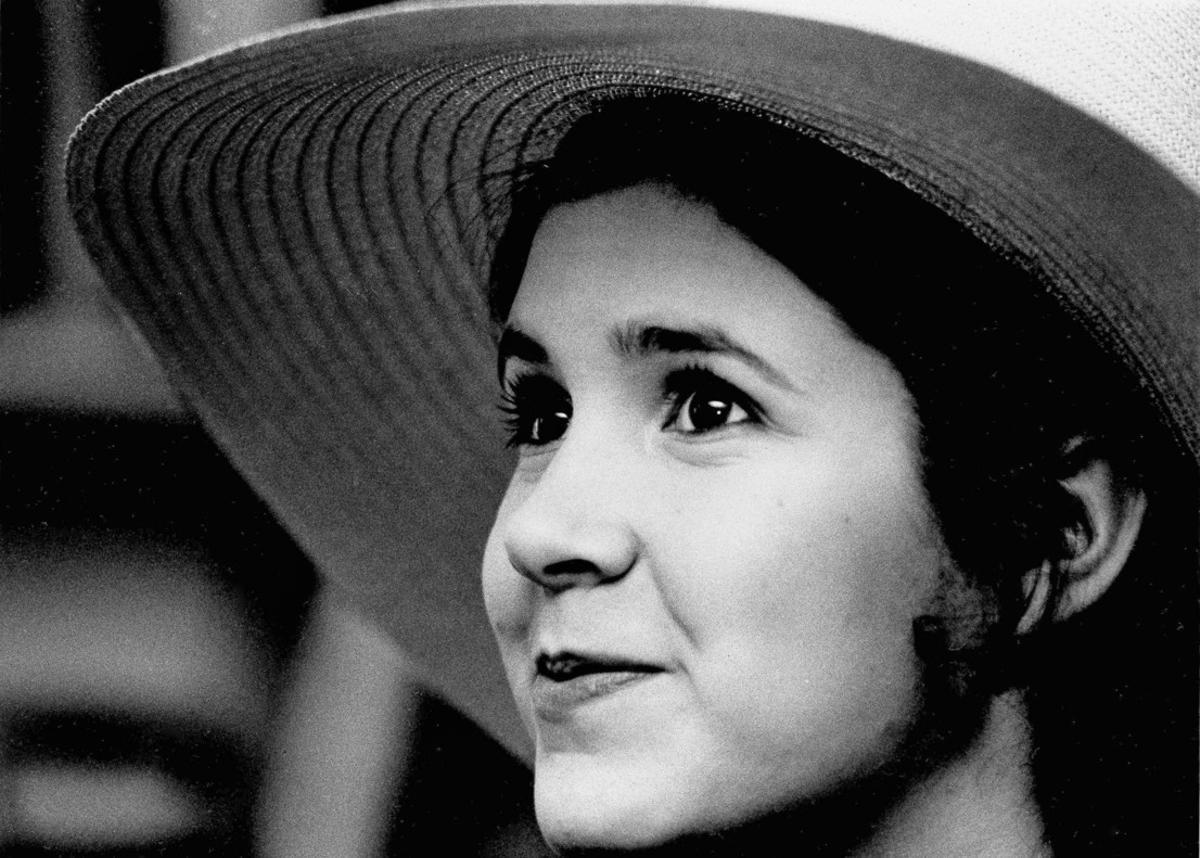 FILE - This May 2, 1973 file photo shows Carrie Fisher, the 16-year-old daughter of Debbie Reynolds and Eddie Fisher, in New York. On Tuesday, Dec. 27, 2016, a publicist says Carrie Fisher has died at the age of 60. (AP Photo/Jerry Mosey, File)