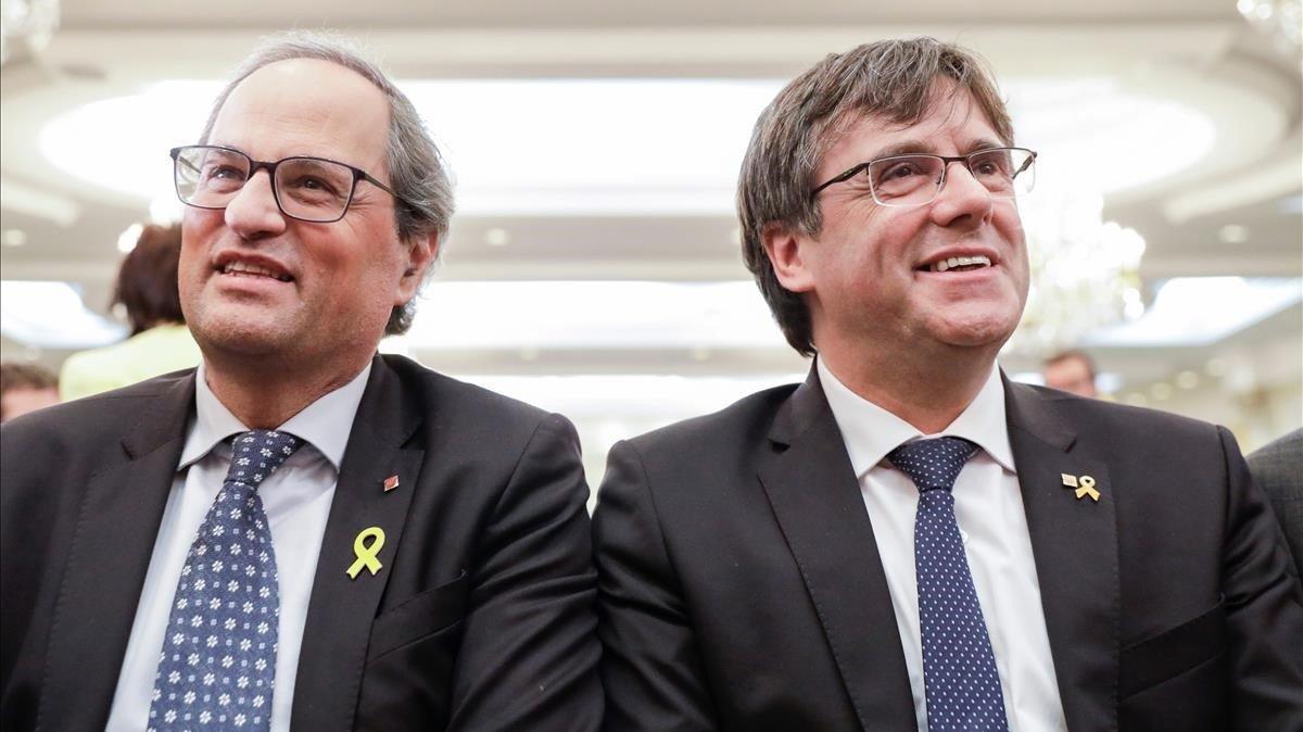 El ’president’ del Govern, Quim Torra, y el expresidente Carles Puigdemont.