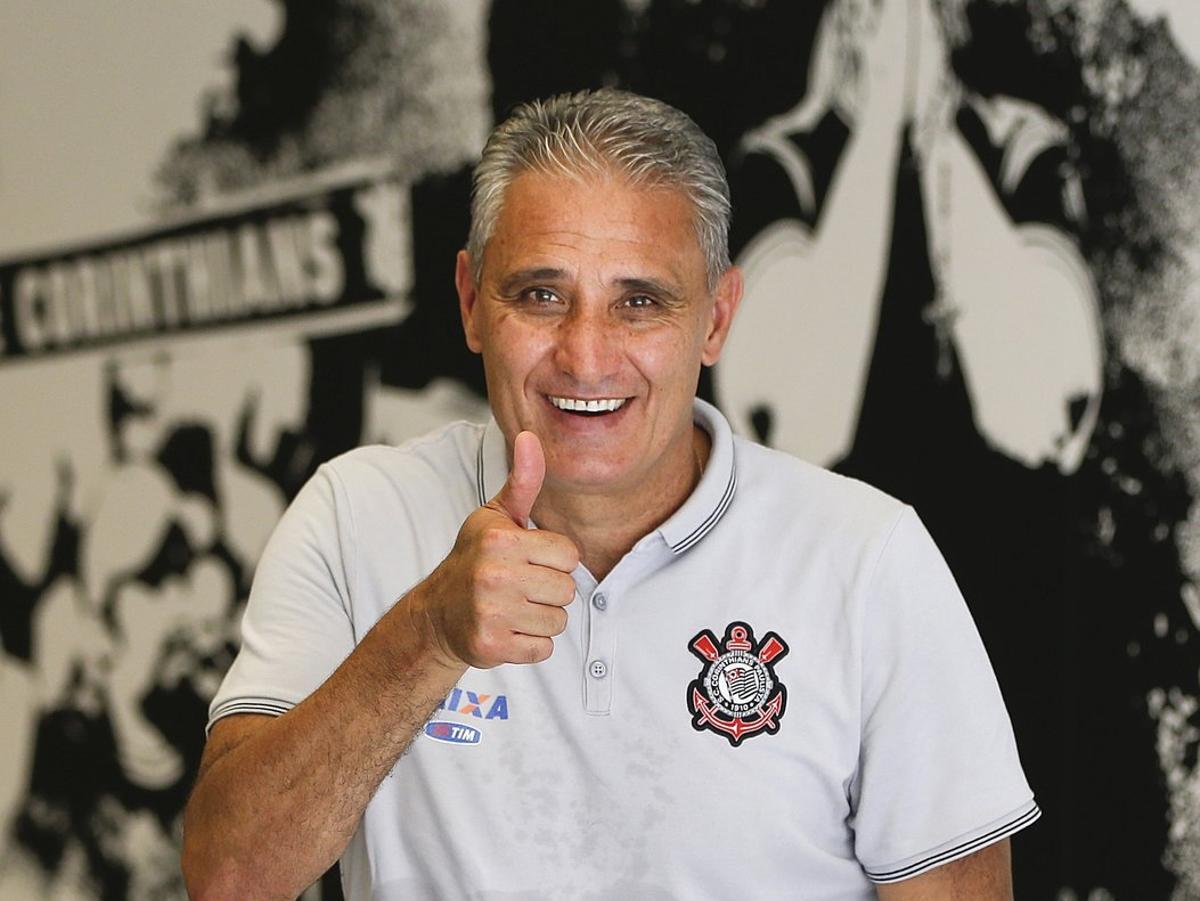 FILE - In this Dec  5  2015 file photo  Corinthians soccer coach Adenor Leonardo Bacchi  known as Tite  flashes a thumbs up as he poses after a team training session at the Itaquerao stadium  in Sao Paulo  Brazil  On Wednesday  June 15  2016  the president of the Corinthians football club announced that Tite  has been named the new coach of Brazil s national team   AP Photo Andre Penner  File