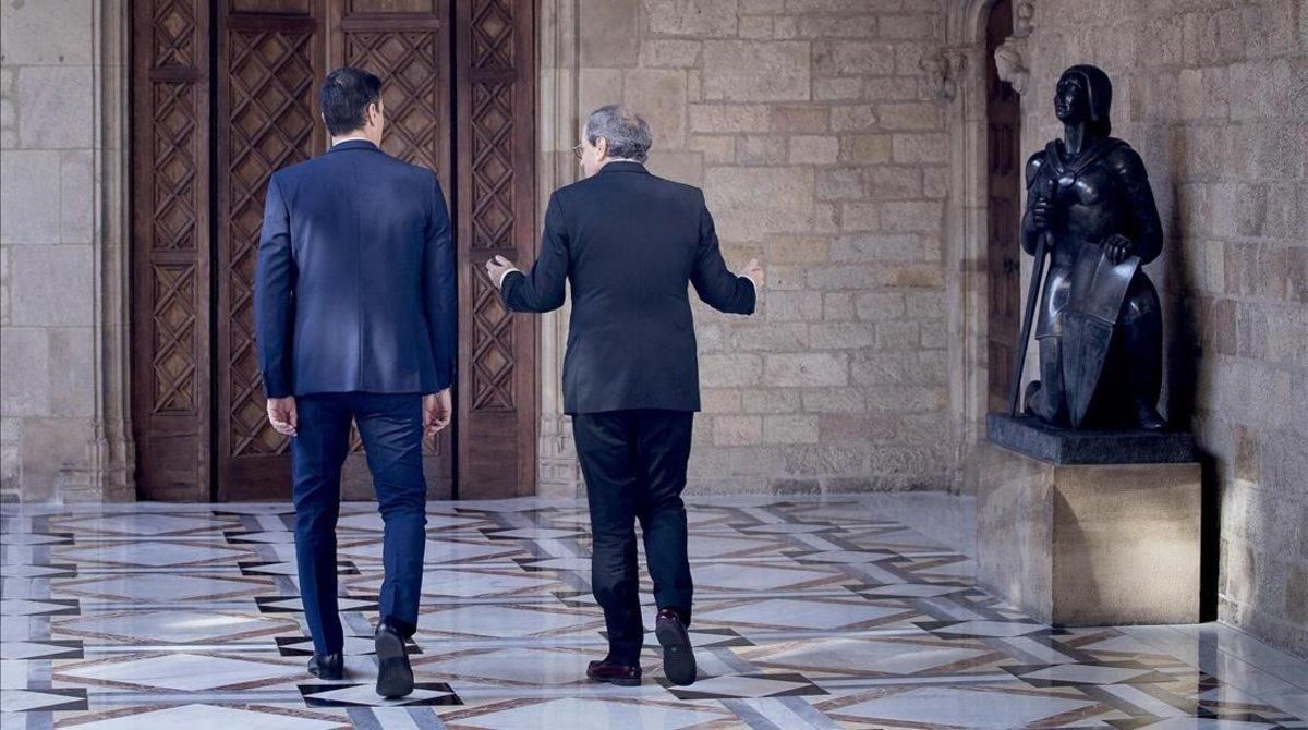Pedro Sánchez y Quim Torra, durante su encuentro en el Palau de la Generalitat, el 6 de febrero. Pedro Sánchez y Quim Torra, durante su encuentro en el Palau de la Generalitat, el 6 de febrero.