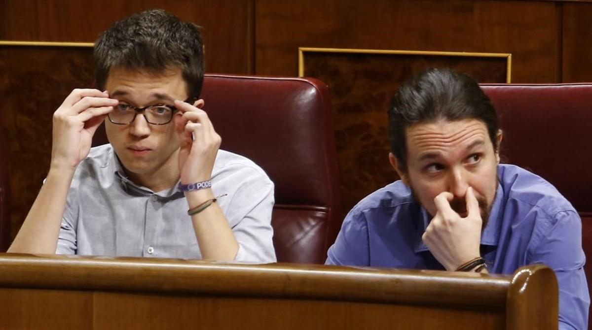 Pablo Iglesias e Íñigo Errejón en sus escaños, este miércoles durante el pleno del Congreso.