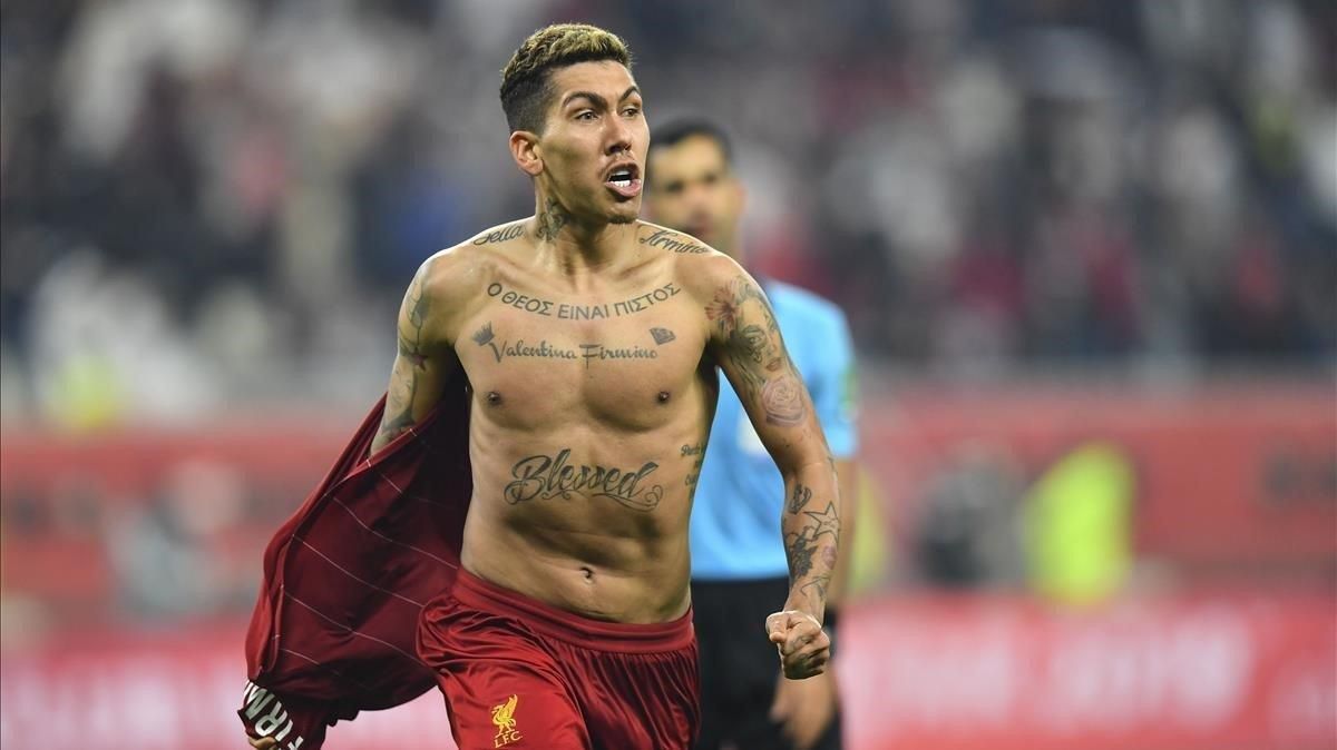 Firmino celebra el gol que le dio al Liverpool el Mundial de Clubs. Firmino celebra el gol que le dio al Liverpool el Mundial de Clubs.