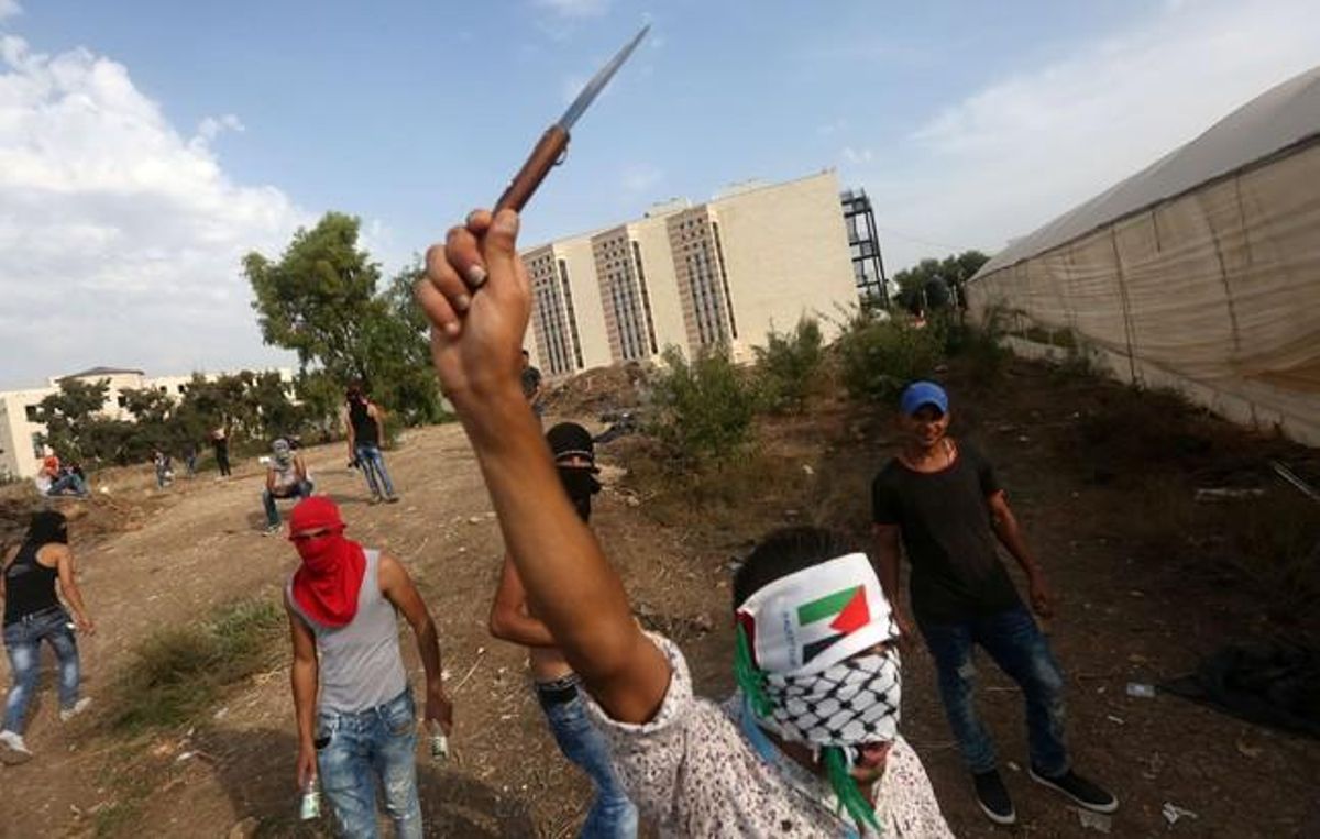 Jóvenes palestinos en Tulkarem, una de las principales ciudades palestinas de Cisjordania, este domingo. Jóvenes palestinos en Tulkarem, una de las principales ciudades palestinas de Cisjordania, este domingo.