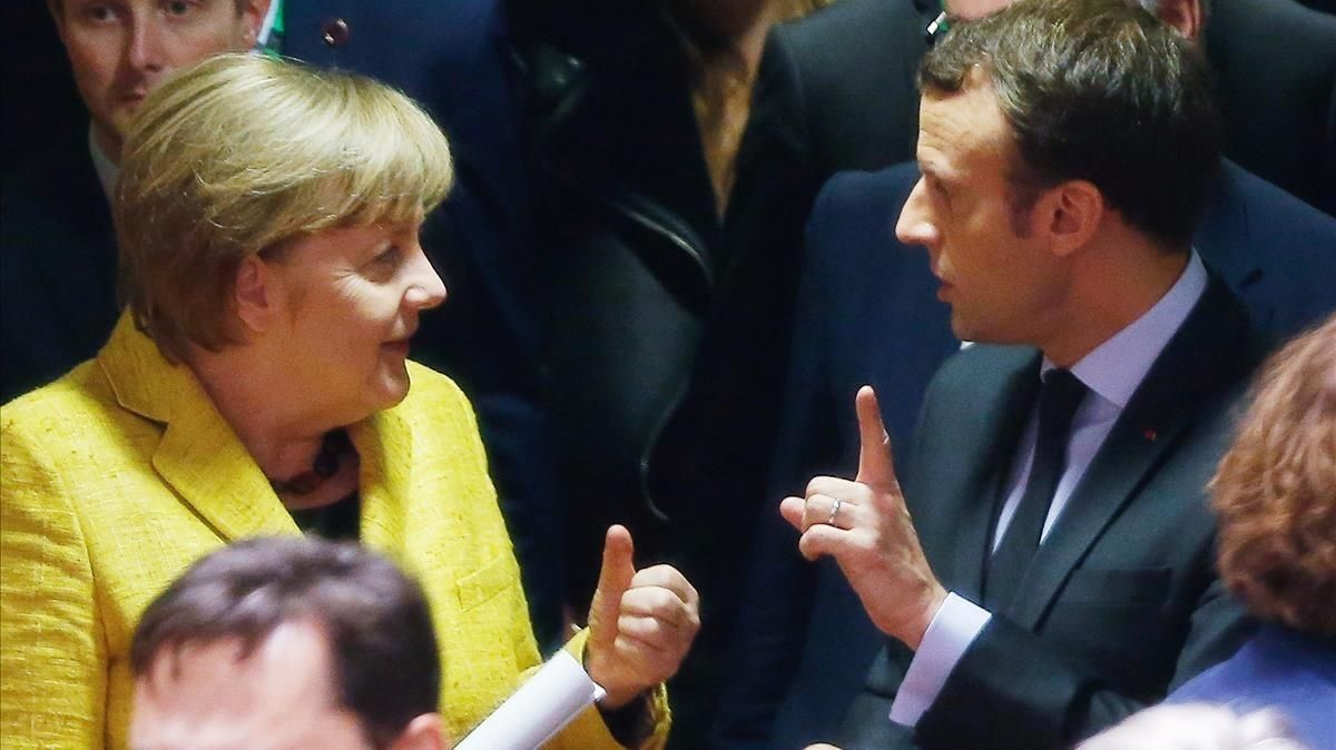 Merkel y Macron, en la cumbre europea en Bruselas. Merkel y Macron, en la cumbre europea en Bruselas.