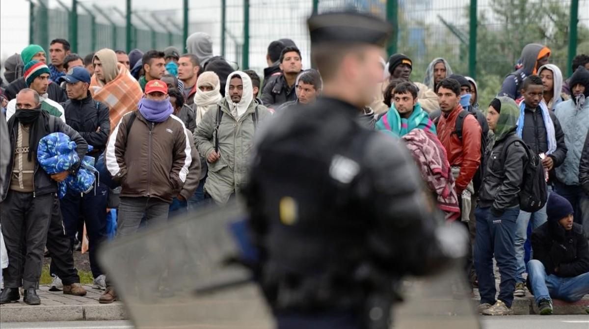 Inmigrantes y refugiados en el campo de Calais. Inmigrantes y refugiados en el campo de Calais.