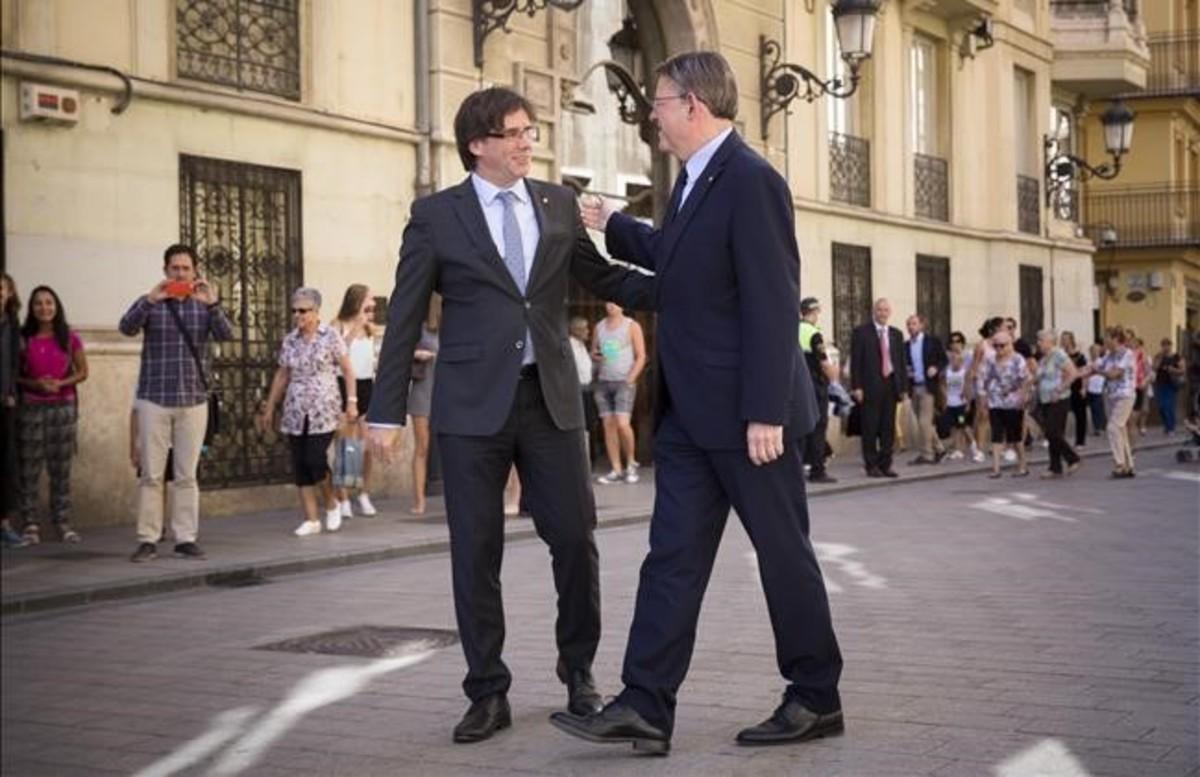 Los presidentes Carles Puigdemont y Ximo Puig, en València, el pasado 19 de septiembre.