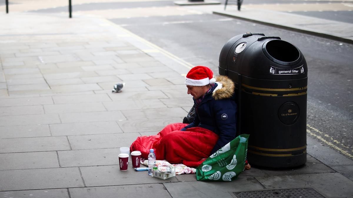 Un indigente, las pasadas navidades, en Oxford Street. Un indigente, las pasadas navidades, en Oxford Street.