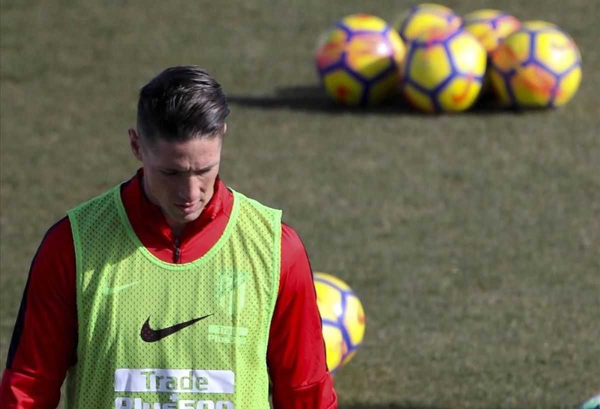 Fernando Torres, durante un entrenamiento con el Atlético la semana pasada. Fernando Torres, durante un entrenamiento con el Atlético la semana pasada.