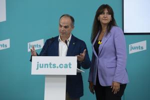 Jordi Turull y Laura Borràs, en una rueda de prensa en la sede del partido.