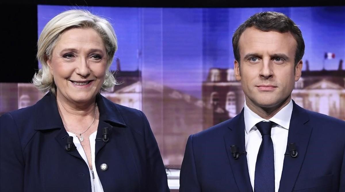 Le Pen y Macron, antes del debate televisivo, en La Plaine-Saint-Denis (norte de París), el 3 de mayo.