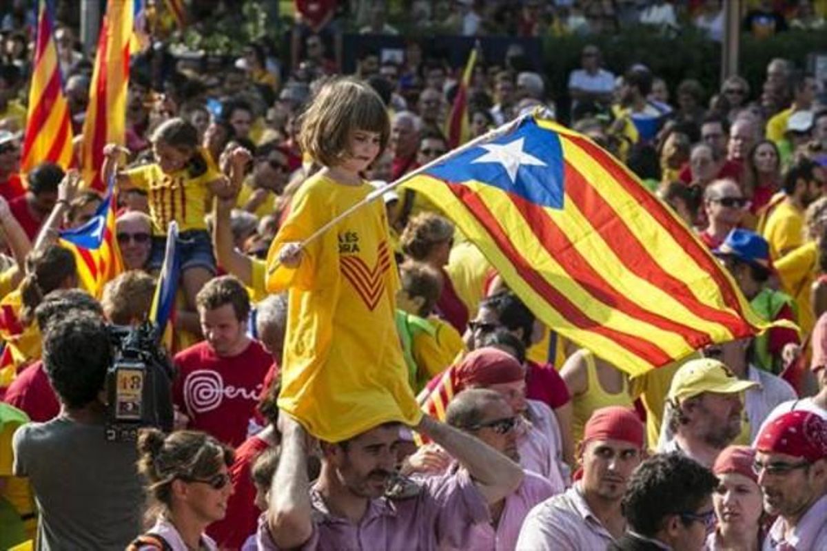 Participantes en la manifestación del 11-S del 2014 en Barcelona. Participantes en la manifestación del 11-S del 2014 en Barcelona.
