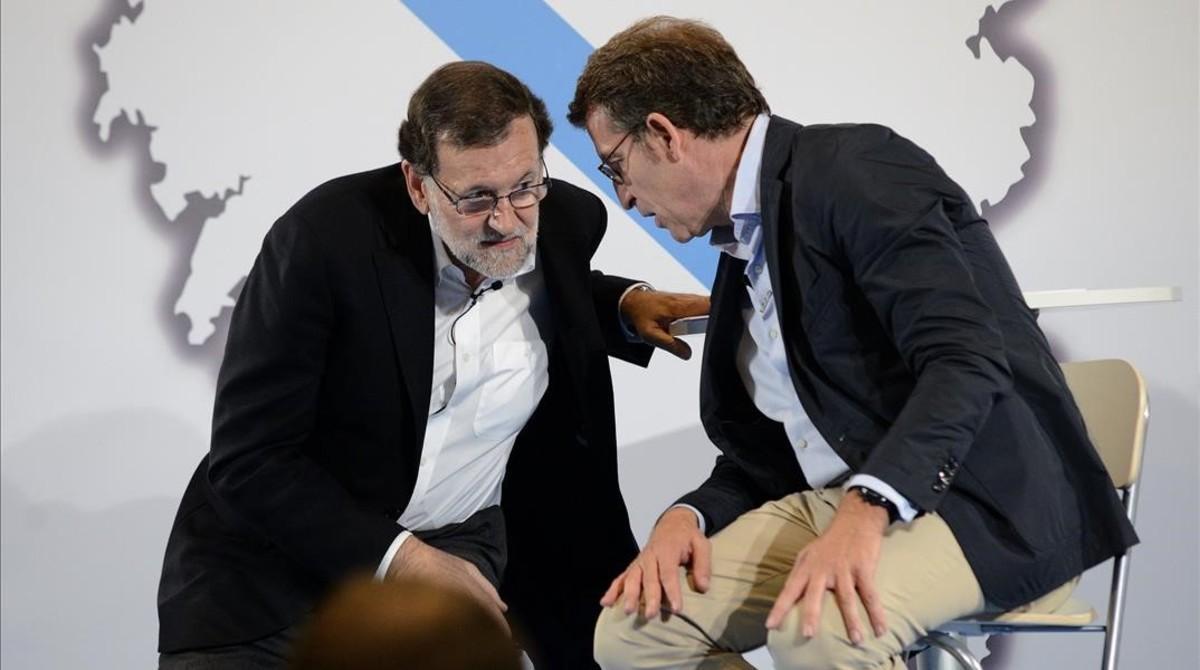 Mariano Rajoy y Alberto Núñez Feijóo, en un acto del PP en Ourense. Mariano Rajoy y Alberto Núñez Feijóo, en un acto del PP en Ourense.