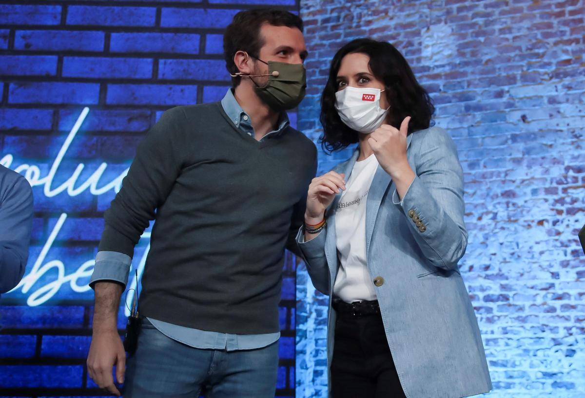 El líder del PP, Pablo Casado, y la candidata a las elecciones madrileñas, Isabel Díaz Ayuso, en el acto de inauguración del Congreso de Nuevas Generaciones del partido El líder del PP, Pablo Casado, y la candidata a las elecciones madrileñas, Isabel Díaz Ayuso, en el acto de inauguración del Congreso de Nuevas Generaciones del partido