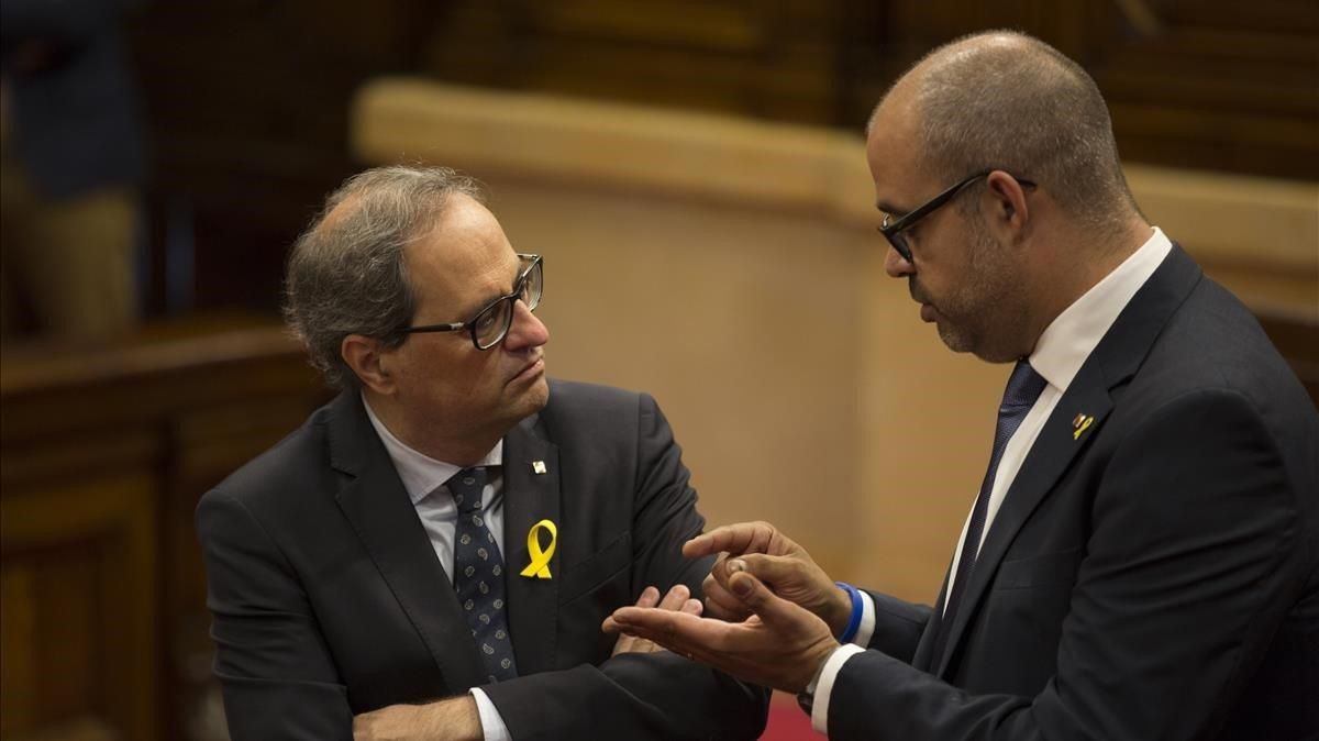 Quim Torra y Miquel Buch, en el Parlament, el pasado julio. Quim Torra y Miquel Buch, en el Parlament, el pasado julio.