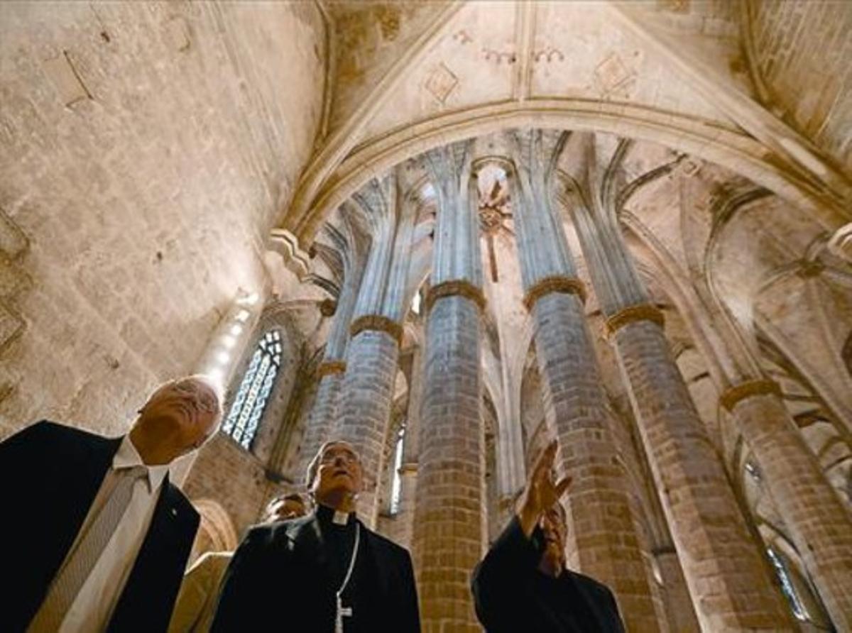 La inauguración. Ferran Mascarell, Martínez Sistach y Josep Maria Martí i Bonet, ayer, en la basílica.
