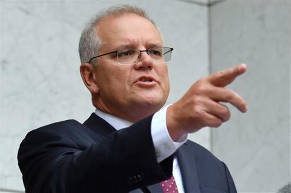 El Primer Ministro Scott Morrison se dirige a los medios de comunicación durante una rueda de prensa en la Casa del Parlamento en Canberra. El Primer Ministro Scott Morrison se dirige a los medios de comunicación durante una rueda de prensa en la Casa del Parlamento en Canberra.