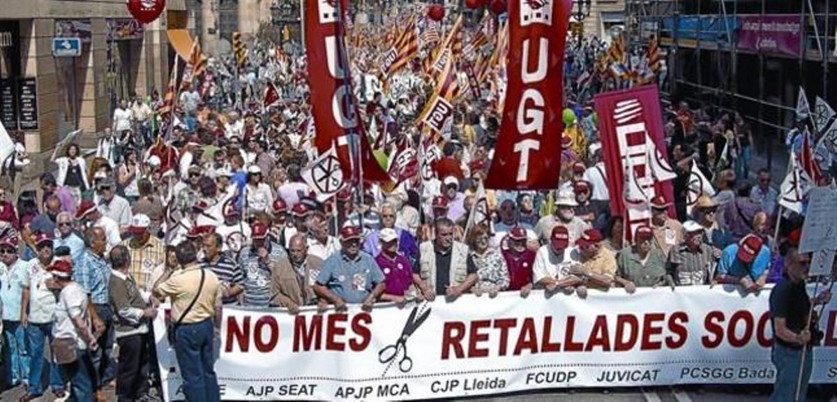 Una de las pancartas de la manifestación, ayer en la Via Laietana. Una de las pancartas de la manifestación, ayer en la Via Laietana.