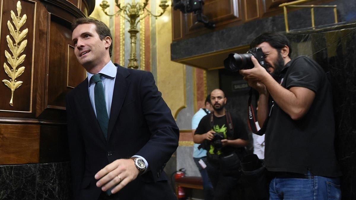 El presidente del PP, Pablo Casado, a su entrada hoy al hemiciclo. El presidente del PP, Pablo Casado, a su entrada hoy al hemiciclo.