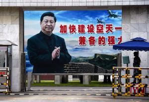 Un cartel con la imagen de Xi Jinping.