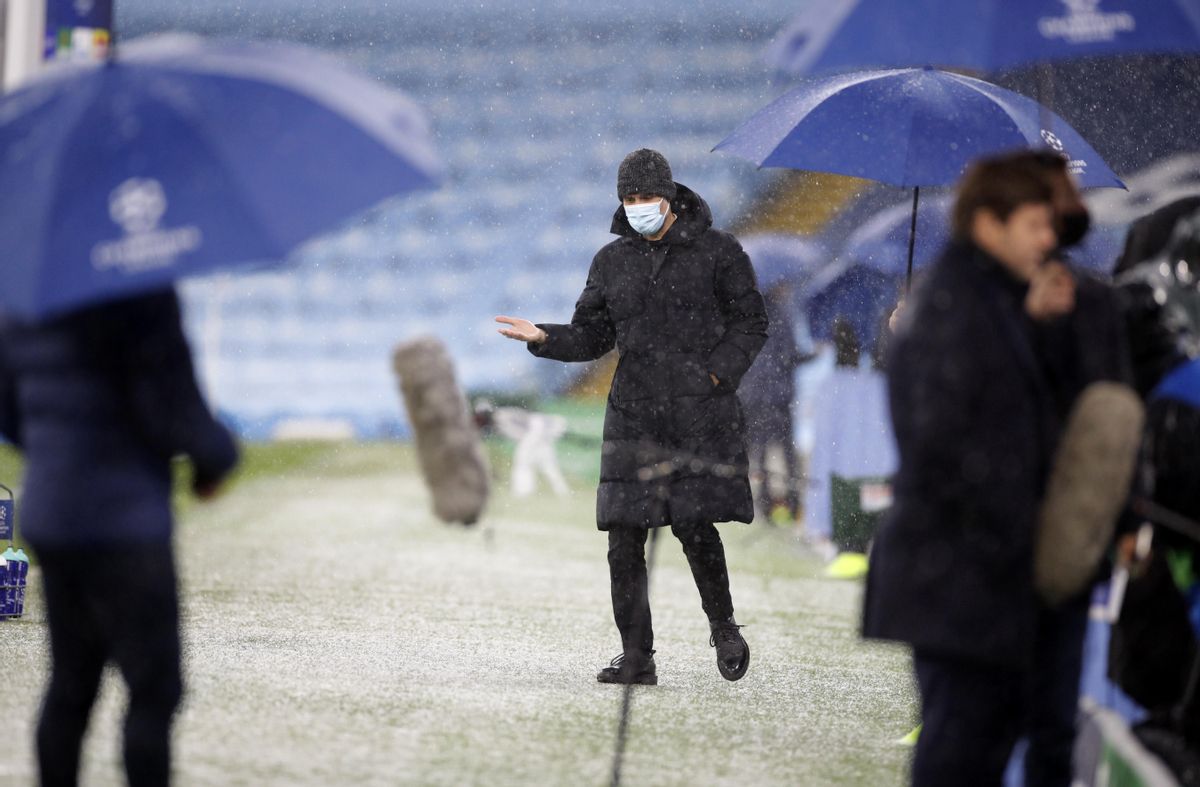 Pep Guardiola, en un Manchester nevado, con granizo y frío. Pep Guardiola, en un Manchester nevado, con granizo y frío.