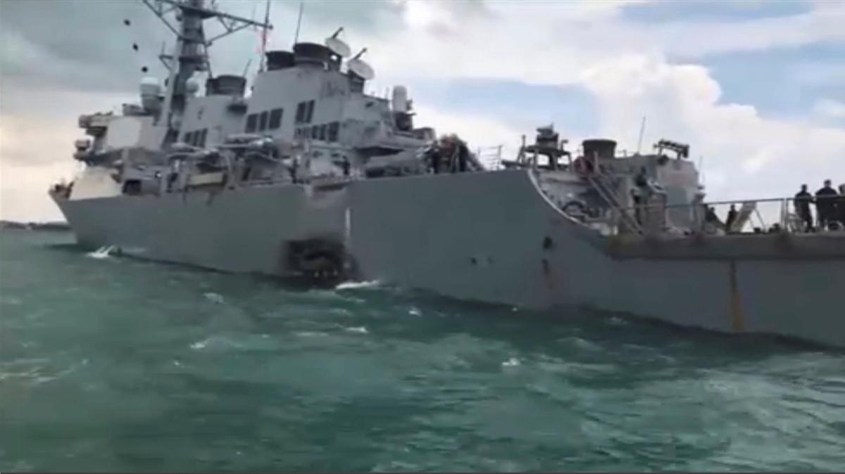 Damage is seen on the U.S. Navy guided-missile destroyer USS John S. McCain after a collision, in Singapore waters in this still frame taken from video August 21, 2017. REUTERS/Reuters TV