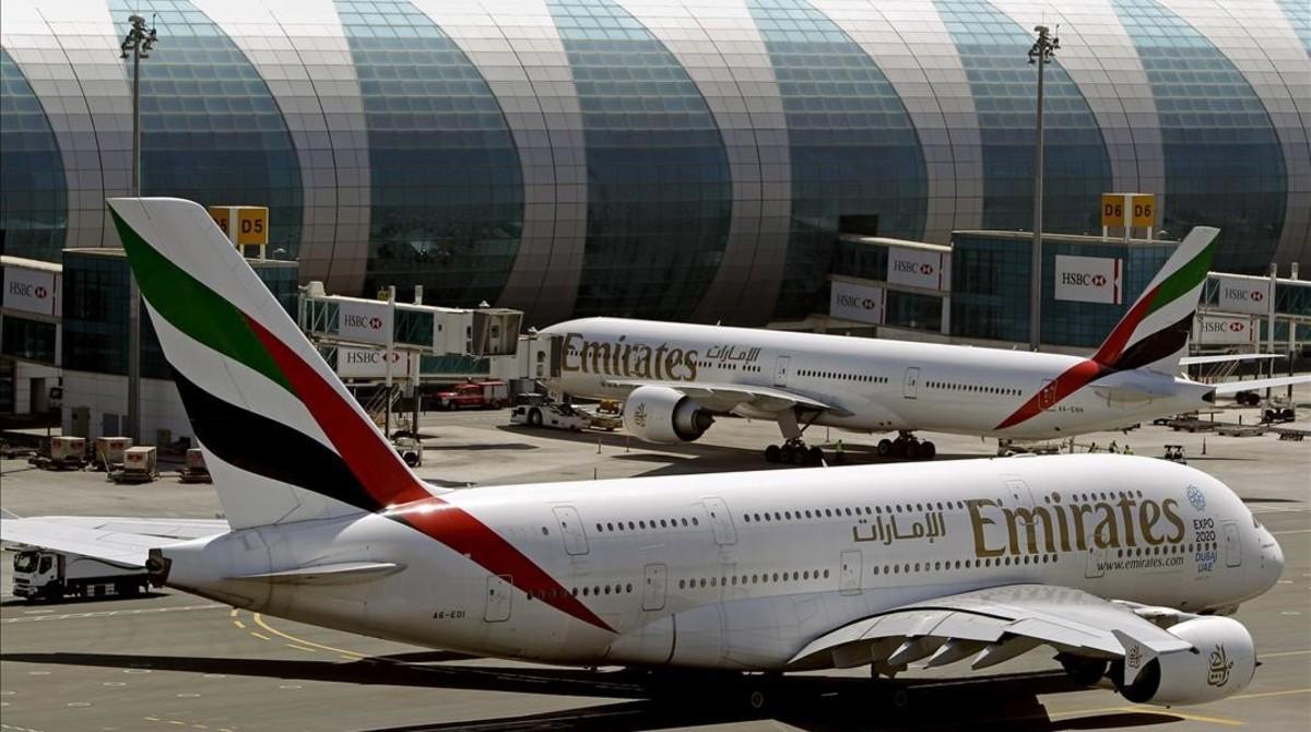 Aviones de la compañía Emirates en el aeropuerto de Dubái, en los Emiratos Árabes Unidos, el 8 de mayo del 2014. Aviones de la compañía Emirates en el aeropuerto de Dubái, en los Emiratos Árabes Unidos, el 8 de mayo del 2014.