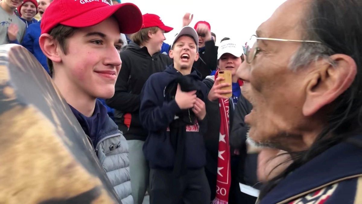 FILE PHOTO: Nicholas Sandmann, 16, a student from Covington Catholic High School stands in front of Native American activist Nathan Phillips in Washington, U.S., in this still image from a January 18, 2019 video by Kaya Taitano. Kaya Taitano/Social Media/via REUTERS/File Photo ATTENTION EDITORS - THIS IMAGE HAS BEEN SUPPLIED BY A THIRD PARTY. MANDATORY CREDIT. NO RESALES. NO ARCHIVE. - RC1618EDA640 FILE PHOTO: Nicholas Sandmann, 16, a student from Covington Catholic High School stands in front of Native American activist Nathan Phillips in Washington, U.S., in this still image from a January 18, 2019 video by Kaya Taitano. Kaya Taitano/Social Media/via REUTERS/File Photo ATTENTION EDITORS - THIS IMAGE HAS BEEN SUPPLIED BY A THIRD PARTY. MANDATORY CREDIT. NO RESALES. NO ARCHIVE. - RC1618EDA640