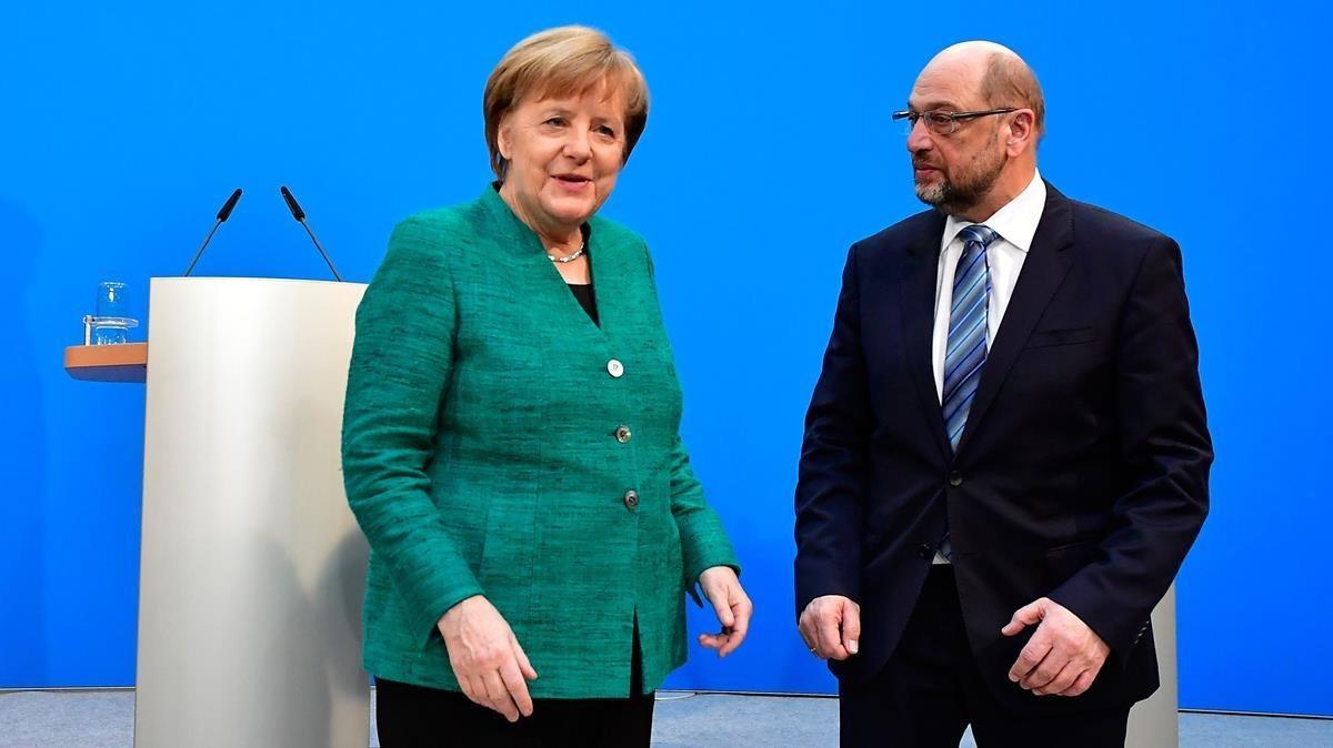 La cancillera Ángela Merkel, líder de la CDU, y Martin Schulz, líder del SPD, tras el acuerdo de la Gran Coalición. 