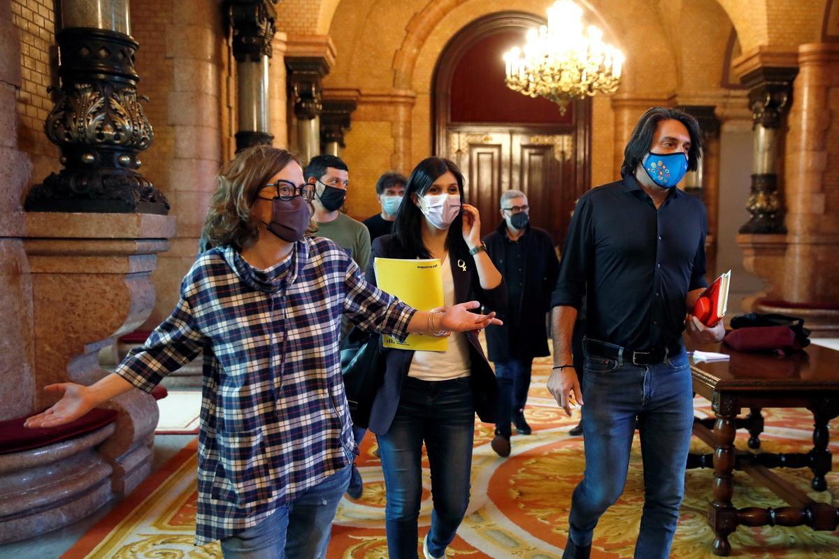 Diputados de la CUP, ERC y Junts; en el Parlament. Diputados de la CUP, ERC y Junts; en el Parlament.