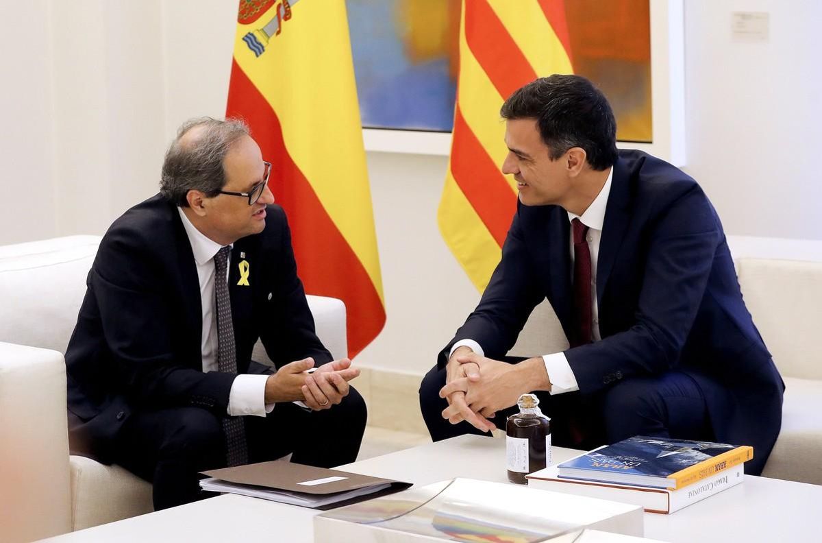 El presidente del Gobierno, Pedro Sánchez, y el ’president’ de la Generalitat, Quim Torra, durante la reunión en la Moncloa. El presidente del Gobierno, Pedro Sánchez, y el ’president’ de la Generalitat, Quim Torra, durante la reunión en la Moncloa.