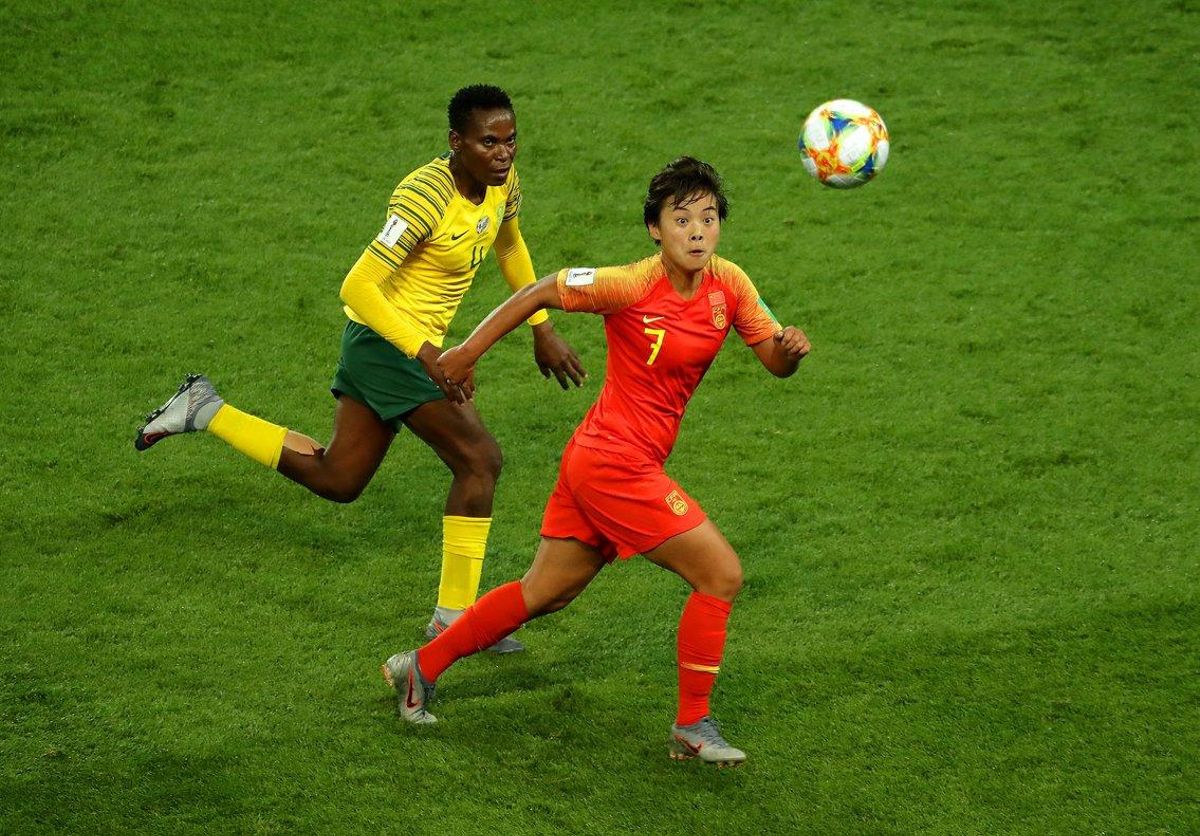 PARIS, FRANCE - JUNE 13: Shuang Wang of China is challenged by Noko Matlou of South Africa during the 2019 FIFA Women’s World Cup France group B match between South Africa and China PR at Parc des Princes on June 13, 2019 in Paris, France. (Photo by Richard Heathcote/Getty Images) PARIS, FRANCE - JUNE 13: Shuang Wang of China is challenged by Noko Matlou of South Africa during the 2019 FIFA Women’s World Cup France group B match between South Africa and China PR at Parc des Princes on June 13, 2019 in Paris, France. (Photo by Richard Heathcote/Getty Images)