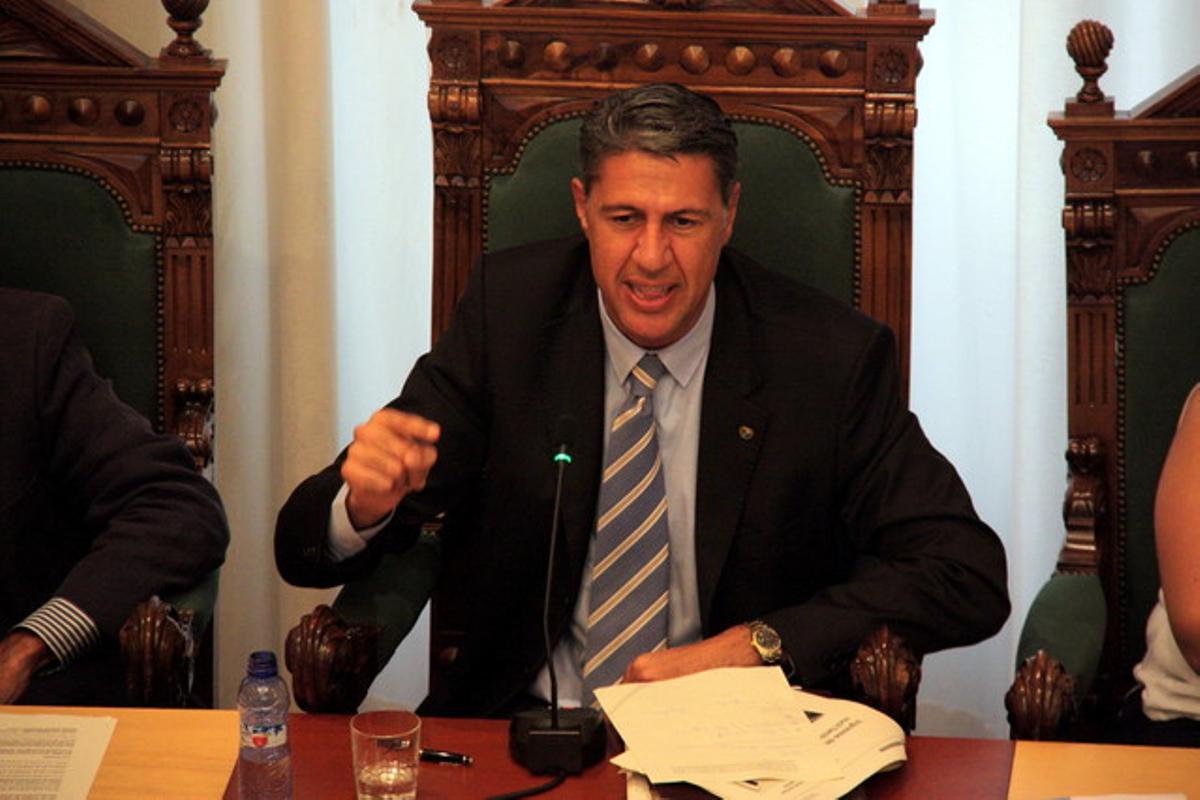 El alcalde de Badalona, Xavier Garcia Albiol, durante el pleno de este lunes. El alcalde de Badalona, Xavier Garcia Albiol, durante el pleno de este lunes.