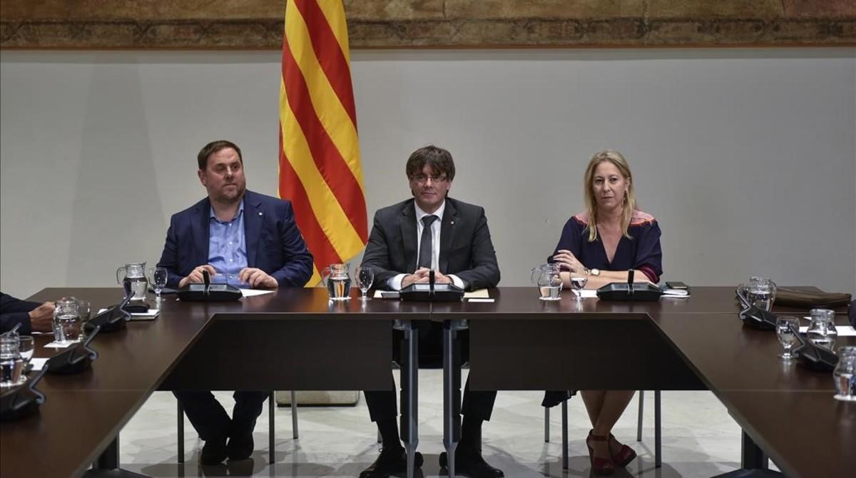 Junqueras, Puigdemont y Munté, esta semana en el Palau de la Generalitat. Junqueras, Puigdemont y Munté, esta semana en el Palau de la Generalitat.