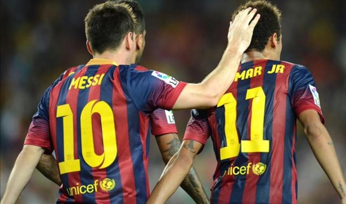Messi y Neymar, tras un gol del Barça al Sevilla.