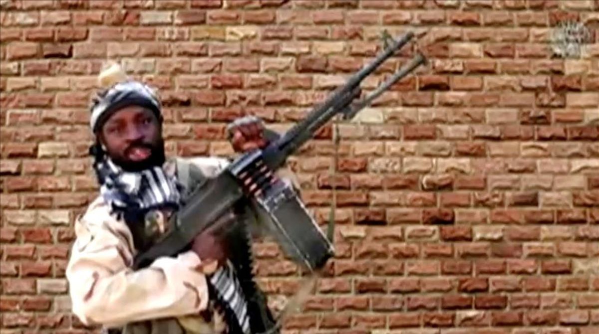 FILE PHOTO The leader of one of the Boko Haram group s factions Abubakar Shekau holds a weapon in an unknown location in Nigeria in this still image taken from an undated video obtained on January 15 2018 Boko Haram Handout Sahara Reporters via REUTERS ATTENTION EDITORS - THIS IMAGE WAS PROVIDED BY A THIRD PARTY MANDATORY CREDIT File Photo FILE PHOTO The leader of one of the Boko Haram group s factions Abubakar Shekau holds a weapon in an unknown location in Nigeria in this still image taken from an undated video obtained on January 15 2018 Boko Haram Handout Sahara Reporters via REUTERS ATTENTION EDITORS - THIS IMAGE WAS PROVIDED BY A THIRD PARTY MANDATORY CREDIT File Photo