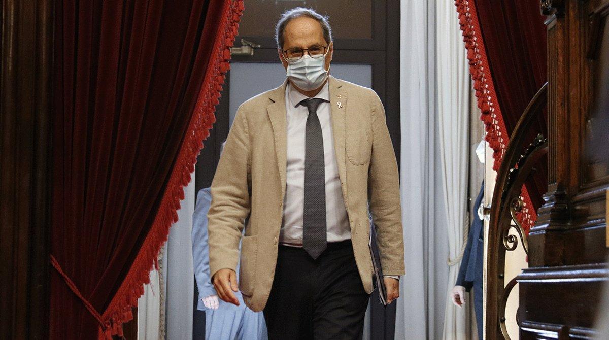 El ’president’ Quim Torra entra en el salón de plenos del Parlament, el pasado 8 de julio. El ’president’ Quim Torra entra en el salón de plenos del Parlament, el pasado 8 de julio.