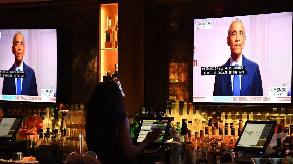 Obama, visto a través de unos televisores mientras participa en la tercera Convención Demócrata Nacional, este miércoles. Obama, visto a través de unos televisores mientras participa en la tercera Convención Demócrata Nacional, este miércoles.