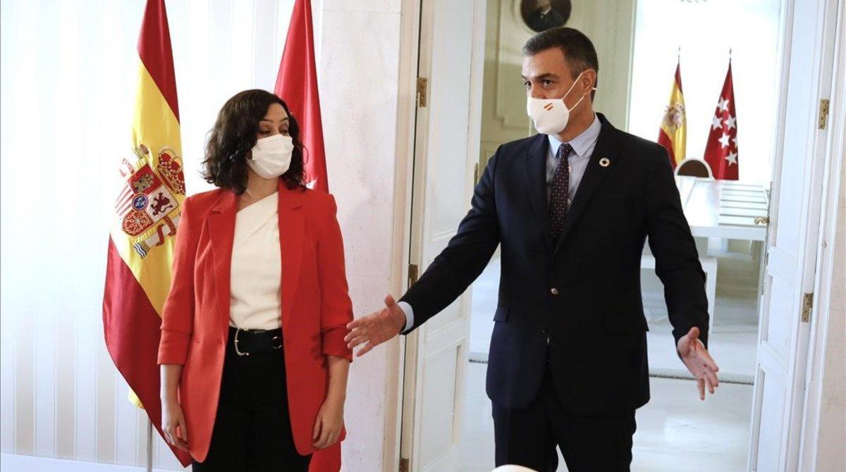 Sánchez i Ayuso aparquen la bronca i uneixen el seu destí contra el virus
