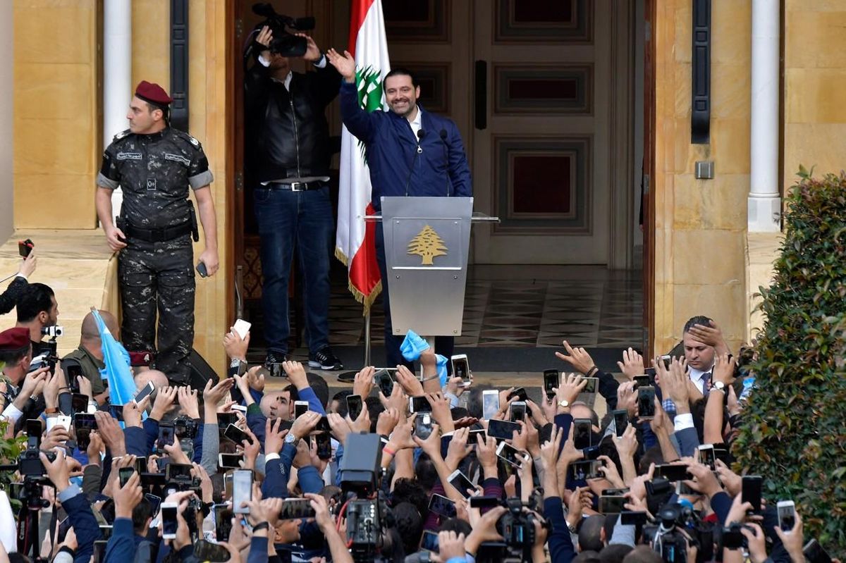 El primer ministro libanés, Saad Hariri, se dirige a sus simpatizantes en Beirut, el Líbano. El primer ministro libanés, Saad Hariri, se dirige a sus simpatizantes en Beirut, el Líbano.
