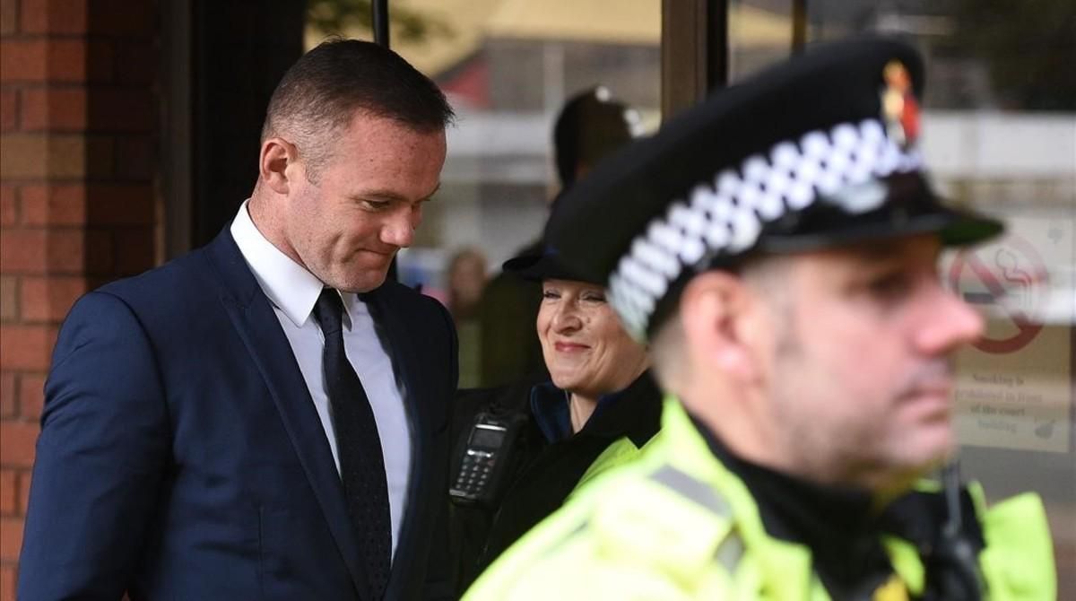 Wayne Rooney, este lunes, a la salida del juzgado de Stockport. Wayne Rooney, este lunes, a la salida del juzgado de Stockport.