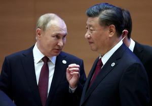 El presidente ruso, Vladímir Putin, conversa con su homólogo chino, Xi Jinping, durante el encuentro que mantuvieron el pasado 16 de septiembre en la cumbre del grupo de Shangái, en Samarcanda.