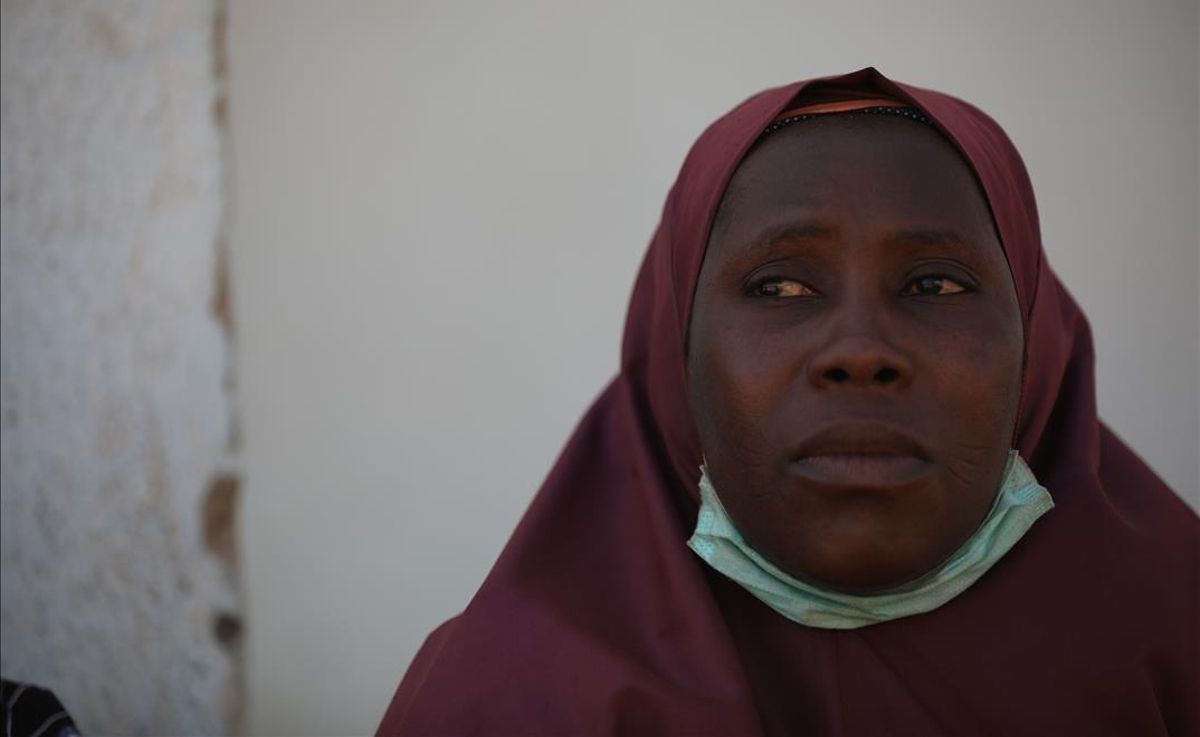 A woman whose son was abducted looks on inside the Government Science where gunmen abducted students in Kankara in northwestern Katsina state Nigeria December 15 2020 - Boko Haram on Tuesday claimed the abduction of hundreds of students marking its first attack in northwestern Nigeria since the jihadist uprising began more than ten years ago (Photo by Kola Sulaimon AFP) A woman whose son was abducted looks on inside the Government Science where gunmen abducted students in Kankara in northwestern Katsina state Nigeria December 15 2020 - Boko Haram on Tuesday claimed the abduction of hundreds of students marking its first attack in northwestern Nigeria since the jihadist uprising began more than ten years ago (Photo by Kola Sulaimon AFP)
