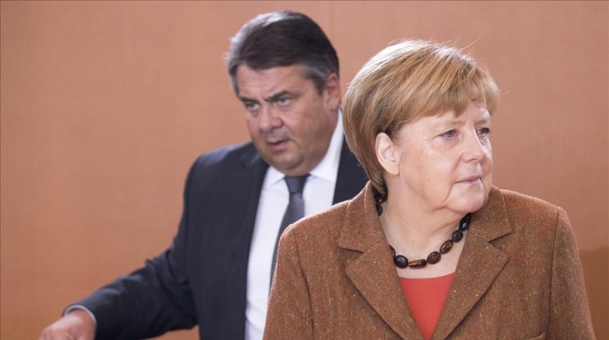 Sigmar Gabriel, con Angela Merkel.