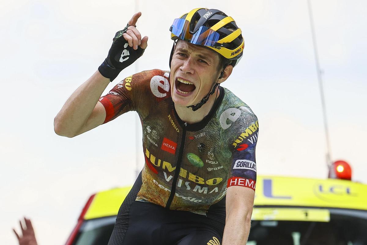 Danish cyclist Jonas Vinegaard of Jumbo-Visma crosses the finish line to win the 11th stage of the 109th edition of the Tour de France cycling race, a 152-kilometer-long mountain stage from Albertville to Col du Granon