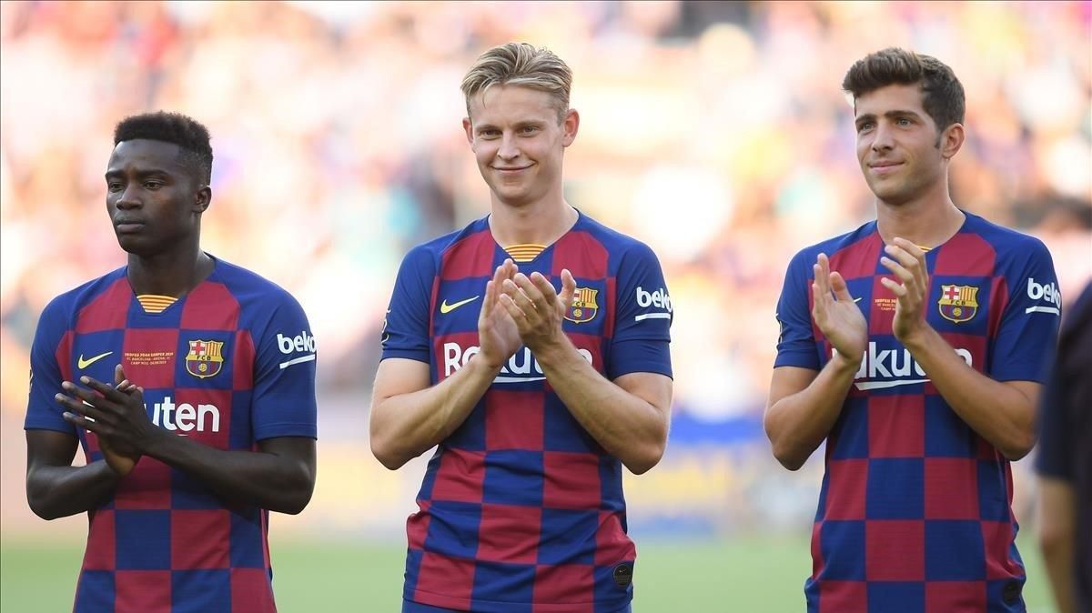 Wagué, De Jong y Sergi Roberto, en el Camp Nou. Wagué, De Jong y Sergi Roberto, en el Camp Nou.