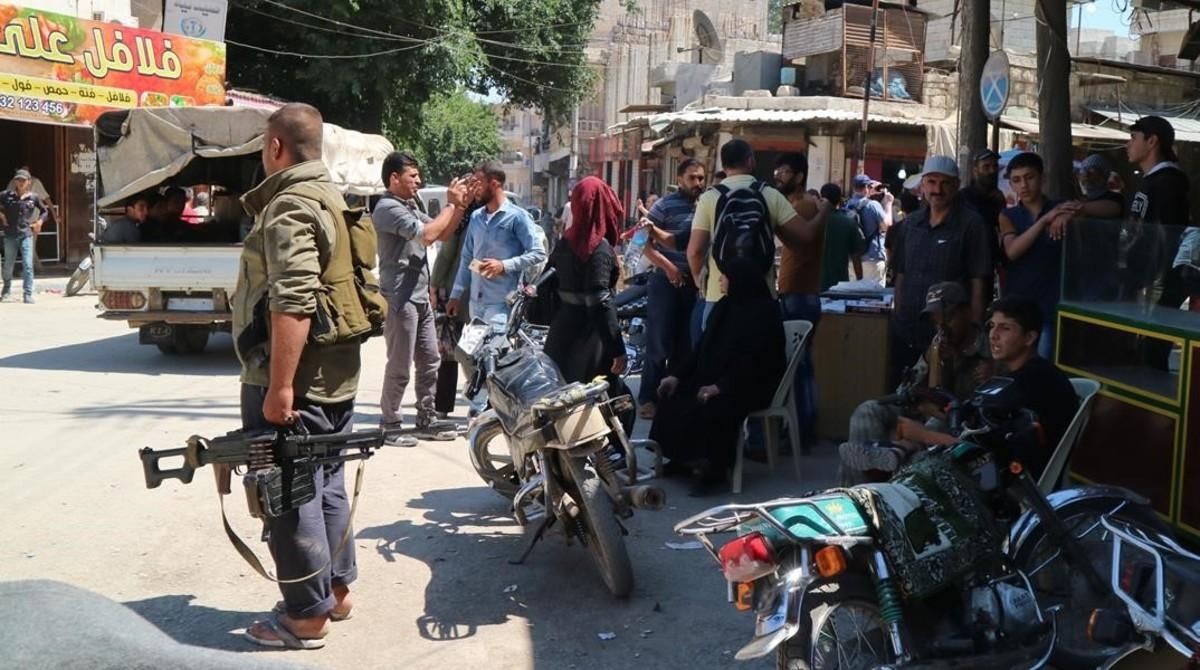 Soldados en el centro de la ciudad de Afrín, al norte de Siria. Soldados en el centro de la ciudad de Afrín, al norte de Siria.